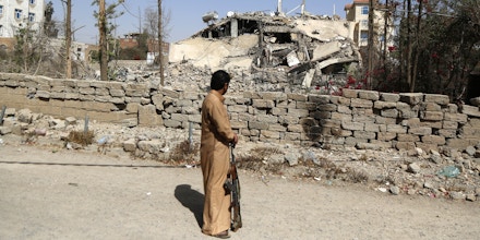 SANA'A, YEMEN - FEBRUARY 04: A man stands looks at a house destroyed in an airstrike carried out by the warplanes of the Saudi-led coalition on February 04, 2019 in Sana'a, Yemen. Pope Francis, in a speech during his roughly 40-hour stay in the United Arab Emirates, said the consequences of war are “before our eyes.” He specifically mentioned Yemen, where his hosts are engaged in a brutal war.