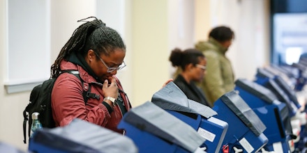 Voters cast their ballots at the polling place in downtown Chicago, Illinois on April 2, 2019. - Chicago residents went to the polls in a runoff election Tuesday to elect the US city's first black female mayor in a historic vote centered on issues of economic equality, race and gun violence. Lightfoot and Toni Preckwinkle, both African-American women, are competing for the top elected post in the city. (Photo by Kamil Krzaczynski / AFP)        (Photo credit should read KAMIL KRZACZYNSKI/AFP/Getty Images)