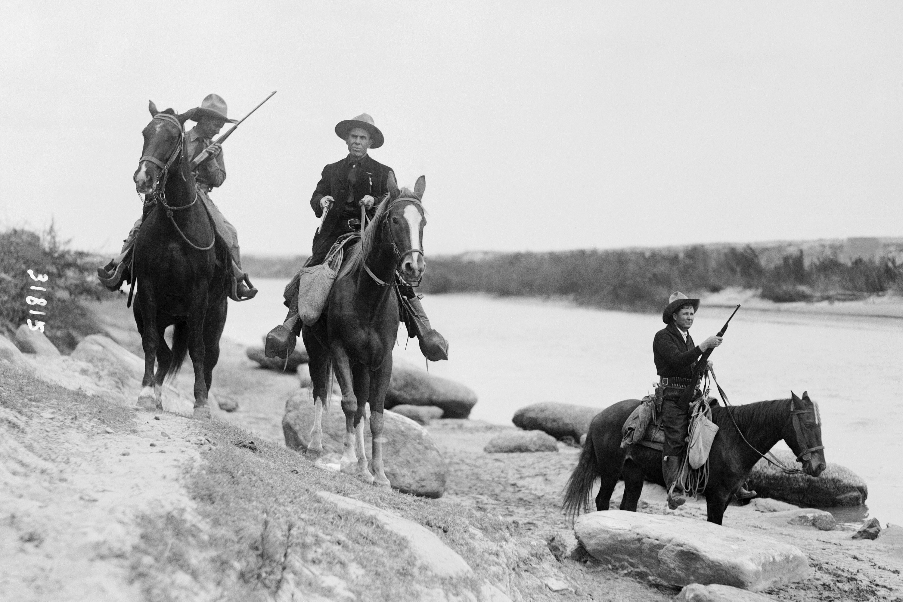 (Original Caption) Texas Rangers patrolling the border.
