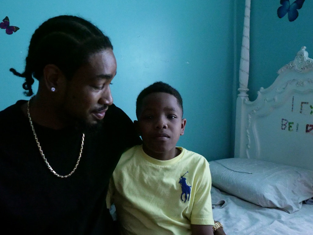 Kraig Lewis and his 9-year-old son, Dyran Kamaani Philips, in April 2019.