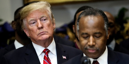 President Donald Trump listens as Secretary of Housing and Urban Development Ben Carson speaks before President Trump sings an Executive Order establishing the White House Opportunity and Revitalization Council in the Roosevelt Room of the White House on December 12, 2018 in Washington, DC. (Photo by Oliver Contreras/SIPA USA)(Sipa via AP Images)