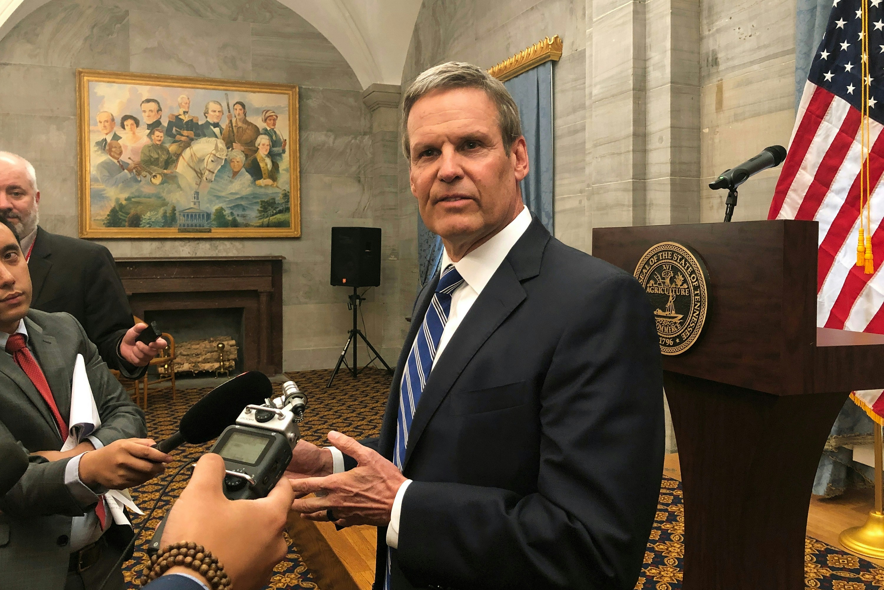 FILE - In this April 25, 2019 file photo, Republican Tennessee Gov. Bill Lee talks to reporters at the Capitol in Nashville, Tenn. More than half of Lee’s newly appointed cabinet members, including his education czar and Tennessee’s Medicaid chief, didn’t submit applications or provide any documents outlining why they deserved the jobs he gave them. The Associated Press reviewed all applications submitted to Lee’s office during his transition into the top statewide position.  This included submissions for both cabinet spots and lower level jobs inside the executive branch. (AP Photo/Kimberlee Kruesi, File)