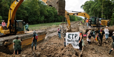 Protestors from the L'eau Est La Vie camp attempt to halt construction of the Bayou Bridge Pipeline in the Atchafalaya Basin of Louisiana on Sept. 3, 2018.