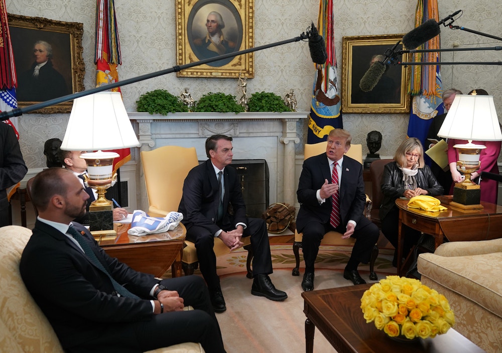 March 19, 2019 - Washington, DC, United States: United States President Donald J. Trump meets with President Jair Bolsonoro of Brazil at the White House. (Chris Kleponis / Polaris)