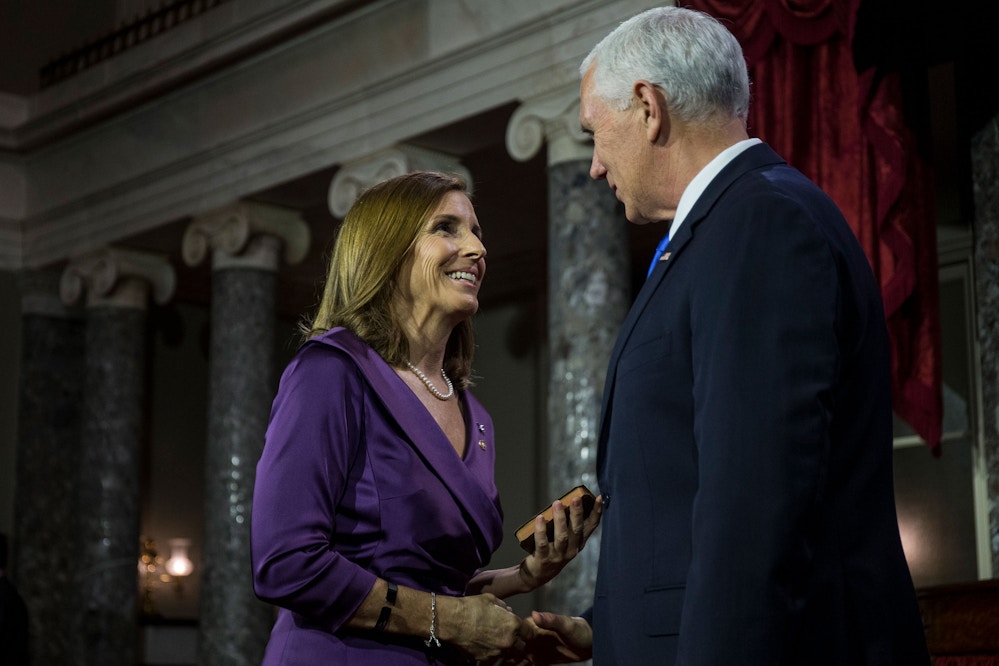 GettyImages-1076859140-Sen-Martha-McSally-with-vp-Pence-1565814590