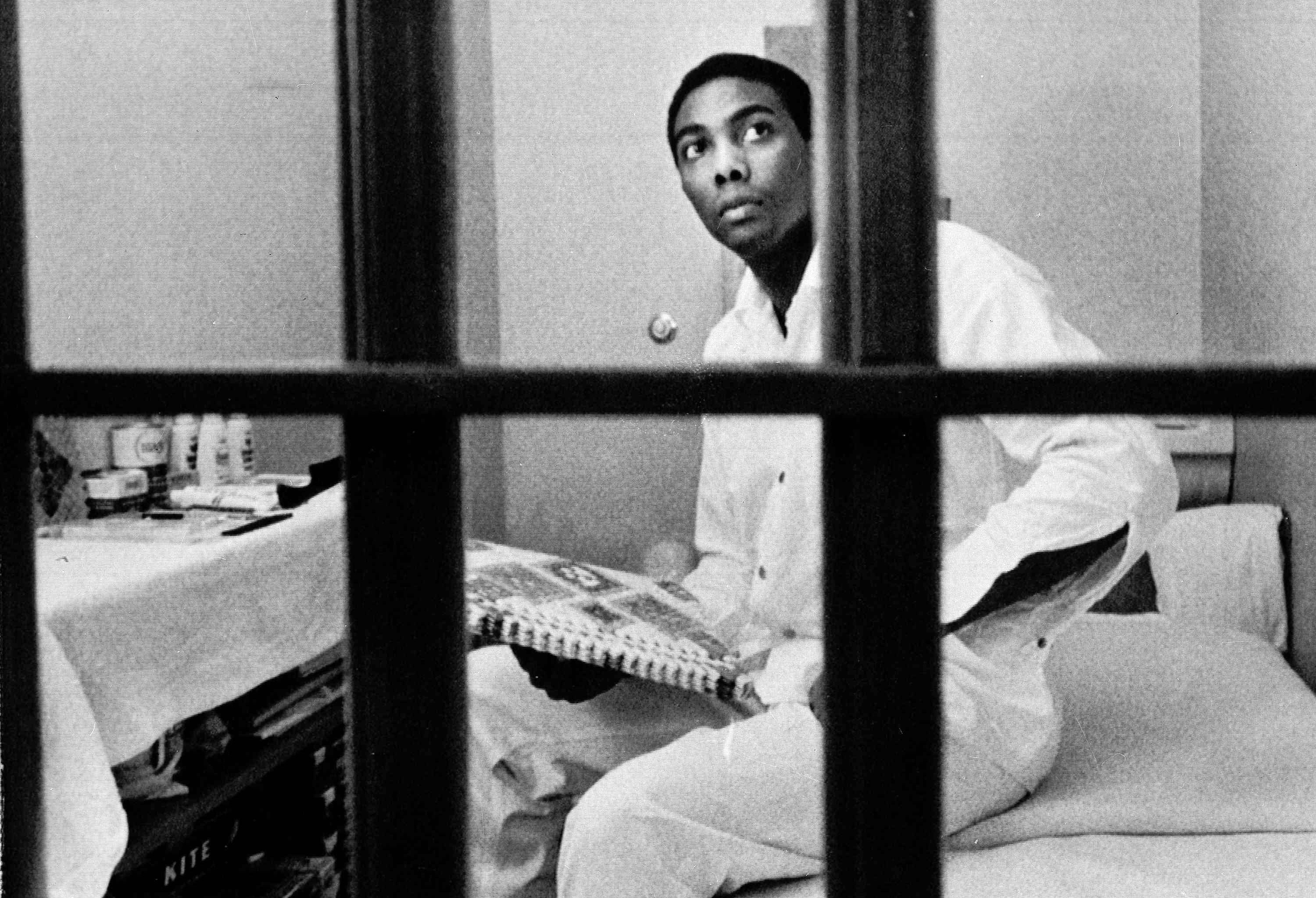 Elmer Branch, 19, under sentence of death for the non-fatal assault on an elderly white woman, was one of three condemned inmates in the country whose death sentences were reversed immediately by the Supreme Court decision, March 5, 1972, Huntsville, Texas. Branch is shown here in his cell on death row in the Ellis Unit of the Texas Department of Corrections. (AP Photo/Ed Kolenovsky)