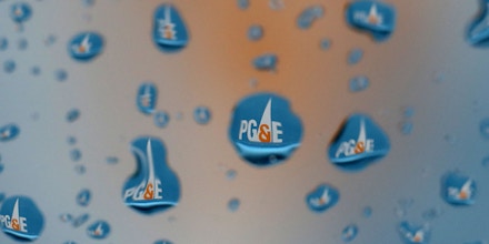 SAN FRANCISCO, CALIFORNIA - JANUARY 15: The Pacific Gas & Electric (PG&E) logo on a truck is visible through raindrops on a window on January 15, 2019 in San Francisco, California.  PG&E announced that they are preparing to file for bankruptcy at the end of January as they face an estimated $30 billion in legal claims for electrical equipment that might have been responsible for igniting destructive wildfires in California. (Photo by Justin Sullivan/Getty Images)