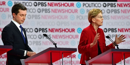 Democratic presidential hopeful Mayor of South Bend, Indiana Pete Buttigieg (L) and Massachusetts Senator Elizabeth Warren participate of the sixth Democratic primary debate of the 2020 presidential campaign season co-hosted by PBS NewsHour & Politico at Loyola Marymount University in Los Angeles, California on December 19, 2019. (Photo by Frederic J. Brown / AFP) (Photo by FREDERIC J. BROWN/AFP via Getty Images)