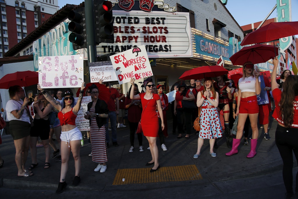 People chant as they march in support of sex workers, Sunday, June 2, 2019, in Las Vegas. People marched in support of decriminalizing sex work and against the Fight Online Sex Trafficking Act and the Stop Enabling Sex Traffickers Act, among other issues. (AP Photo/John Locher)