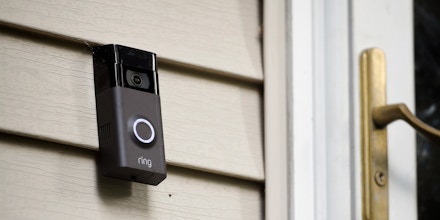 In this Tuesday, July 16, 2019, photo, a Ring doorbell camera is seen at a home in Wolcott, Conn. A group of Democratic U.S. senators is questioning Amazon about the security of its Ring doorbell cameras following reports that some Ukraine-based employees had access to video footage from customers’ homes. (AP Photo/Jessica Hill)