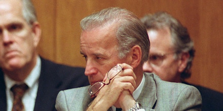 UNITED STATES - FEBRUARY 12:  IMF--Senate Foreign Relations Chairman Jesse Helms, R-N.C., left, and Ranking Member Joseph Biden, D-Del., during a hearing on the International Monetary Fund.  (Photo by Scott J. Ferrell/Congressional Quarterly/Getty Images)