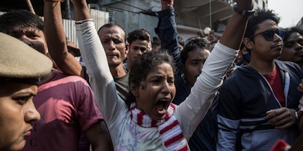 Protestors shout anti-CAB and anti-government slogans during a protest in Guwahati, Assam, Dec. 10, 2019.Indian protestors raise pro-people and anti-Modi slogans, during a strike called by All Assam Students Union (AASU) and the North East Students Organisation (NESO) in protest against the Citizenship Amendment Bill on Tuesday, Dec. 10, 2019, in Guwahati, Assam, India.
