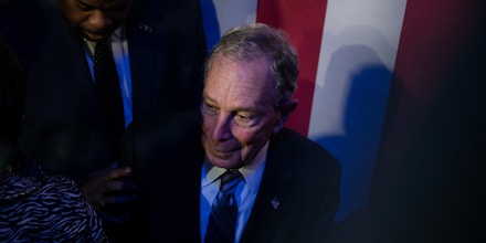 Democratic presidential candidate Mike Bloomberg steps off the stage after a speech in Houston, Texas, on Feb. 13, 2020.
