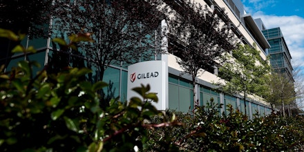 Signage is displayed outside Gilead Sciences Inc. headquarters in in Foster City, California, U.S., on Thursday, March 19, 2020. Gilead Sciences stock jumped as much as 7% on Thursday, reaching a two-year high, as a Piper Sandler analyst doubled down on his call on the approval prospects for the biotech company's experimental therapy for the pandemic now sweeping the U.S. Photographer: David Paul Morris/Bloomberg via Getty Images