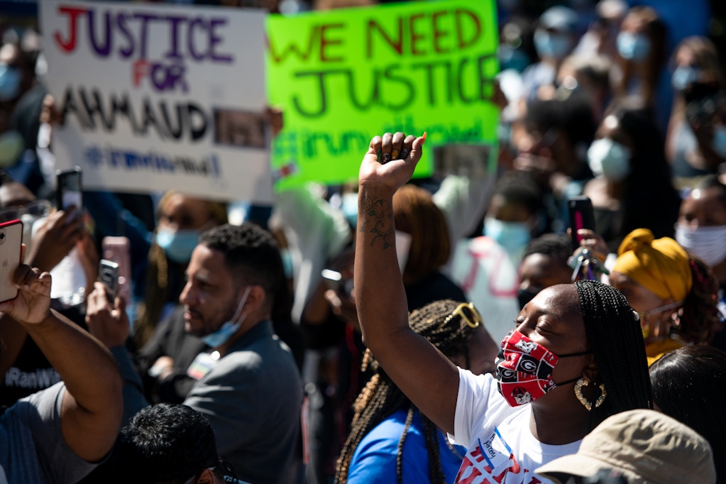 BRUNSWICK, GA - MAY 08: Demonstrators protest the shooting death of Ahmaud Arbery at the Glynn County Courthouse on May 8, 2020 in Brunswick, Georgia. Gregory McMichael and Travis McMichael were arrested the previous night and charged with murder. (Photo by Sean Rayford/Getty Images)