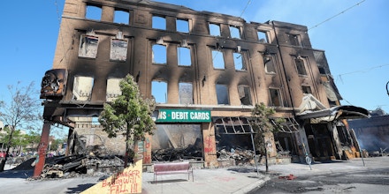 MINNESOTA, USA - MAY 30: A view of a building, burnt down within protests against the death of an unarmed black man George Floyd, who was killed as he was pinned down by a white Minneapolis, Minnesota police officer on May 30, 2020, in Minneapolis, United States. (Photo by Tayfun Coskun/Anadolu Agency via Getty Images)