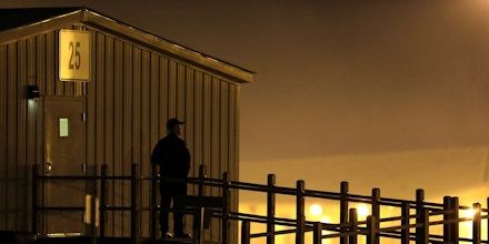 Security personnel stands outside a perimeter building at the Eastern Reception, Diagnostic & Correctional Center in in Bonne Terre, Mo., before the scheduled execution of Missouri death row inmate Joseph Paul Franklin Tuesday, Nov. 19, 2013. Franklin, a white supremacist who targeted blacks and Jews in a cross-country killing spree from 1977 to 1980, was put to death Wednesday in Missouri, the state's first execution in nearly three years. (AP Photo/Jeff Roberson)