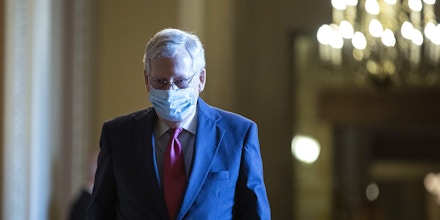 Senate Majority Leader Mitch McConnell, a Republican from Kentucky, wears a protective mask as he walks to the Senate Floor at the U.S. Capitol in Washington, D.C., U.S., on Tuesday, May 19, 2020. Lawmakers will receive an update today on implementation of the $2.2 trillion virus rescue package passed by Congress in March. Photographer: Stefani Reynolds/Bloomberg via Getty Images