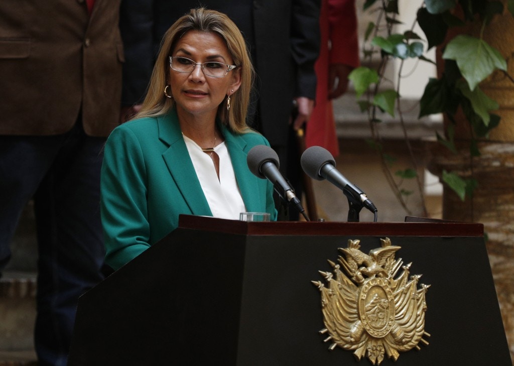 Bolivia's interim President Jeanine Anez addresses the nation at the presidential palace in La Paz, Bolivia, Wednesday, Jan. 22, 2020. The message marked the anniversary of the naming of Bolivia as the "Plurinational State of Bolivia," by former President Evo Morales. (AP Photo/Juan Karita)