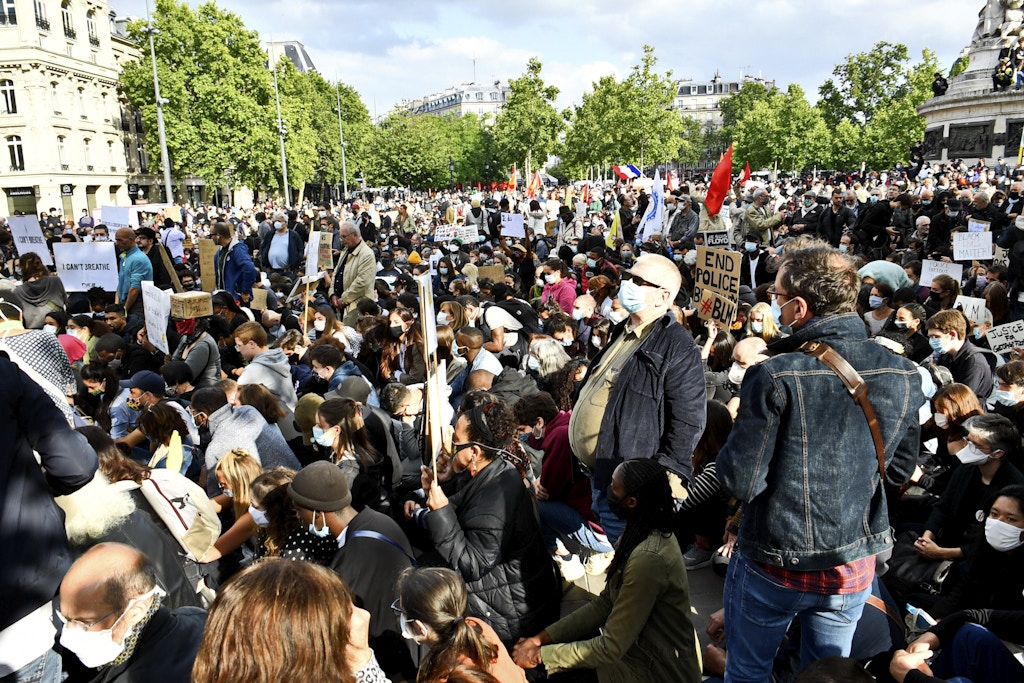 Protesters take part during a rally in the Place de la Republique square in Paris, France, against racism and police brutality in the wake of the death of George Floyd, an unarmed black man killed while apprehended by police in Minneapolis, USA, on June 09, 2020. Photo by Karim Ait Adjedjou/Avenir Pictures/Abaca/Sipa USA(Sipa via AP Images)