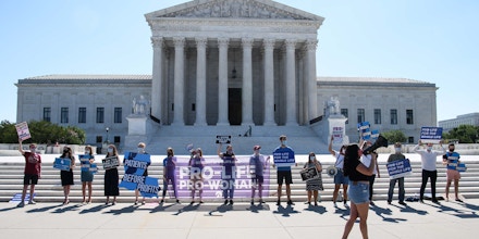 Anti-abortion activists demonstrate in front of the US Supreme Court in Washington, DC, on June 29, 2020. - The court rejected Louisiana's restrictions on abortion in a key victory for abortion rights activists. The conservative-leaning court split 5-4 on the decision overruling a state law that requires doctors who perform abortions to have admitting privileges at a nearby hospital. (Photo by NICHOLAS KAMM / AFP) (Photo by NICHOLAS KAMM/AFP via Getty Images)