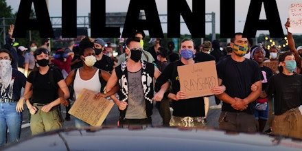 Protesters block a freeway during a rally against racial inequality and the police shooting death of Rayshard Brooks, in Atlanta, Georgia, on June 13, 2020. 