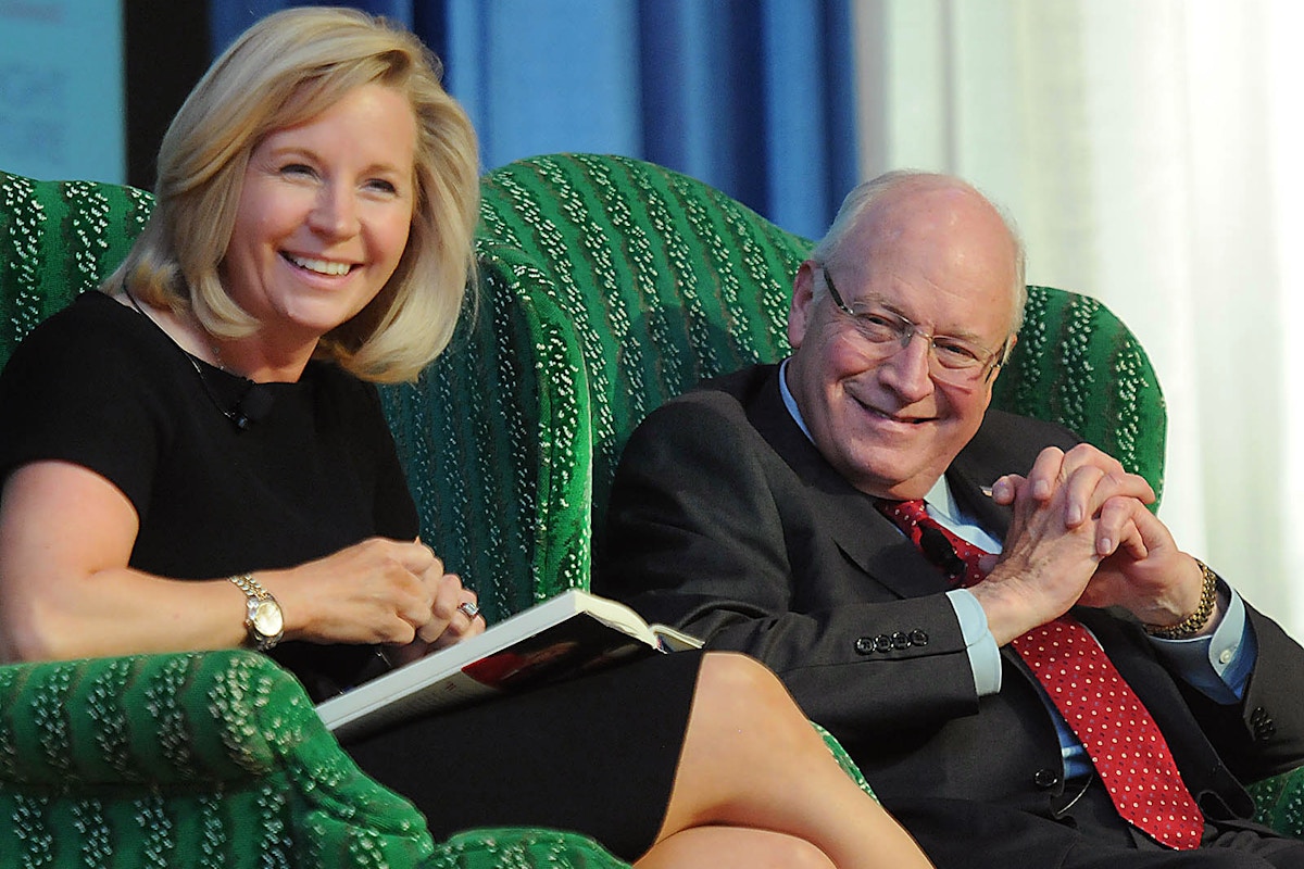 Former Vice President Dick Cheney, right, gestures as he speaks with his daughter Liz Cheney during the West Virginia Chamber of Commerce annual meeti