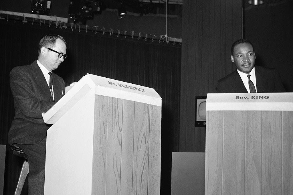 James J. Kilpatrick, left, an editor of the Richmond, Va., News-Leader, appears with integration leader Martin Luther King Jr., before their debate on "Are Sit-In Strikes Justifiable" which was televised  November 26, 1960 from NBC's New York studios.       (AP Photo)