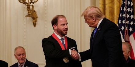 U.S. President Donald Trump, right, shakes hands with Ryan Williams, president of the Claremont Institute for the Study of Statesmanship & Political Philosophy, who is accepting the National Humanities Medal on behalf of the institute during an event in the East Room of the White House in Washington, D.C., U.S., on Thursday, Nov. 21, 2019. Now that House Democrats have wrapped their last scheduled public hearing on Ukraine they have to decide whether to schedule more, or move to the next step toward impeaching President Trump. Photographer: Alex Wroblewski/Bloomberg