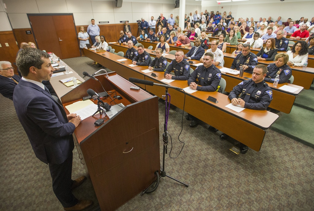 Democratic Presidential candidate and South Bend, Indiana Mayor Pete Buttigieg speaks to newly sworn in police officers on Wednesday, June 19, 2019, at the South Bend Police Department. Buttigieg is telling officers after a fatal police shooting that they must activate their body cameras during any interaction with civilians. (Robert Franklin/South Bend Tribune via AP)
