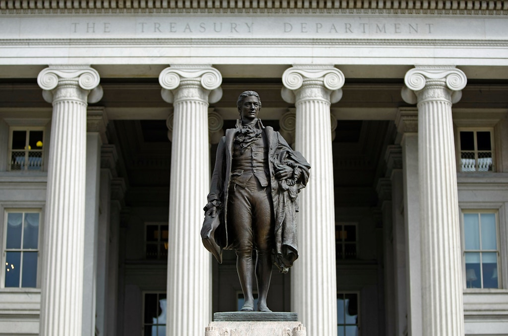 WASHINGTON - SEPTEMBER 19:  A statue of the first United States Secretary of the Treasury Alexander Hamilton stands in front of the U.S. Treasury September 19, 2008 in Washington, DC. Treasury Secretary Henry Paulson announced that the Treasury will insure money market mutual funds as one part of a massive government bailout that is attempting to stabilize the current financial crisis.  (Photo by Chip Somodevilla/Getty Images)