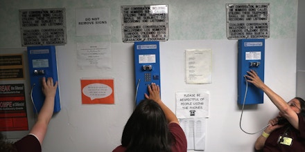 NIANTIC, CT - MAY 24:  Prison inmates make one of their daily allotment of six phone calls at the York Community Reintegration Center on May 24, 2016 in Niantic, Connecticut. The center is part of the York Correctional Institution, which houses all of the state's more than 1,000 female inmates. The unit is designed to prepare prisoners for successful reintegration into society after serving out their sentences. Criminal justice and prison reforms are taking hold with bi-partisan support nationwide in an effort to reduce prison populations, while saving taxpayer money. The state's criminal justice reforms are part of Connecticut Governor Dannel Malloy's 'Second Chance Society' legislation.   (Photo by John Moore/Getty Images)