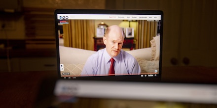 Chris Coons, a Democrat from Delaware, speaks during the virtual Democratic National Convention seen on a laptop computer in Tiskilwa, Illinois.