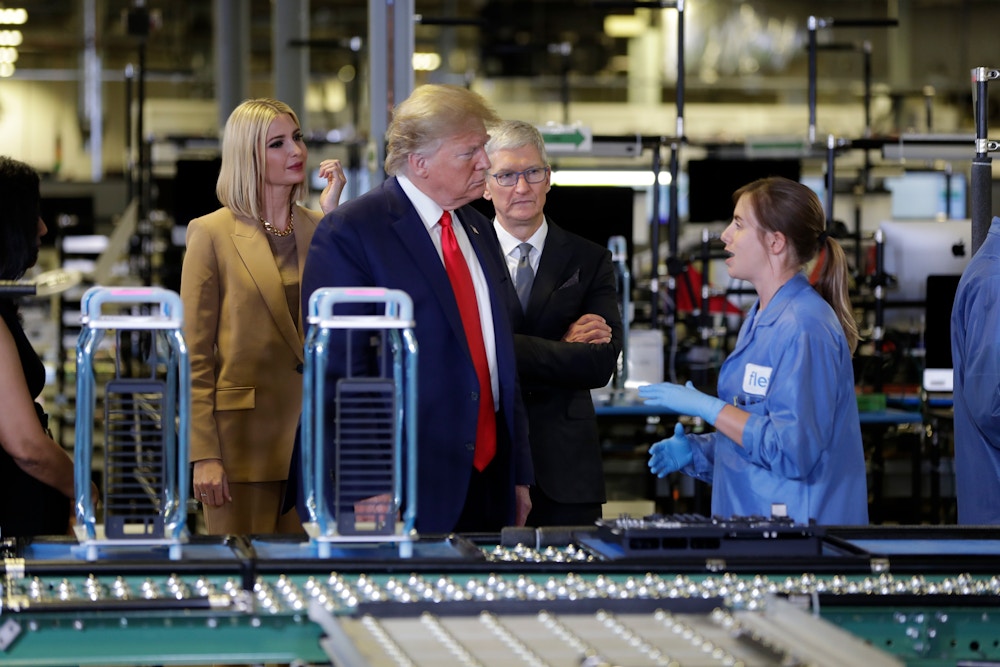 President Donald Trump tours an Apple manufacturing plant, Wednesday, Nov. 20, 2019, in Austin with Apple CEO Tim Cook and Ivanka Trump, the daughter and adviser of President Donald Trump, left. (AP Photo/ Evan Vucci)