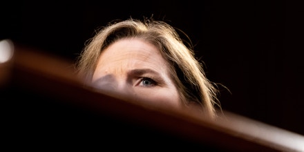 Amy Coney Barrett, U.S. President Donald Trump's nominee for associate justice of the U.S. Supreme Court, listens during a Senate Judiciary Committee confirmation hearing in Washington, D.C., U.S., on Wednesday, Oct. 14, 2020. Senate Democrats enter a second day of questioning Barrett having made few inroads in their fight to keep her off the Supreme Court and elicited few clues about how she would rule on key cases. Photographer: Erin Schaff/The New York Times/Bloomberg via Getty Images