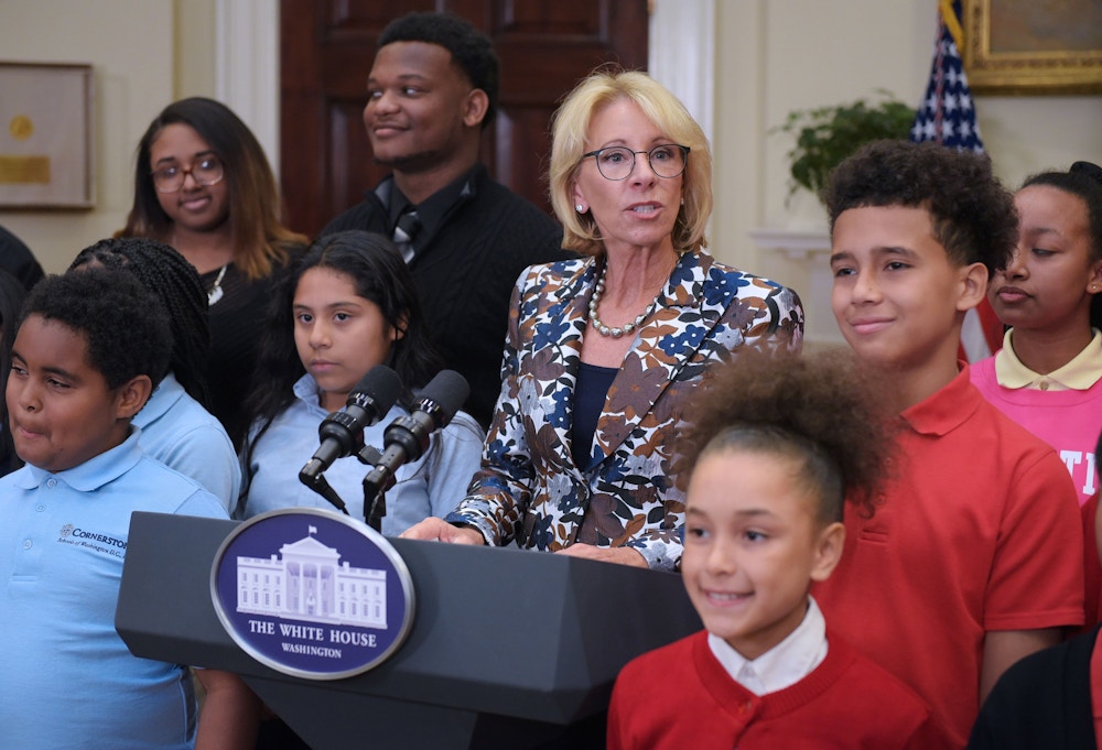 US Education Secretary Betsy DeVos speaks at a school choice event in the Roosevelt Room of the White House on May 3, 2017 in Washington, DC. / AFP PHOTO / MANDEL NGAN        (Photo credit should read MANDEL NGAN/AFP via Getty Images)