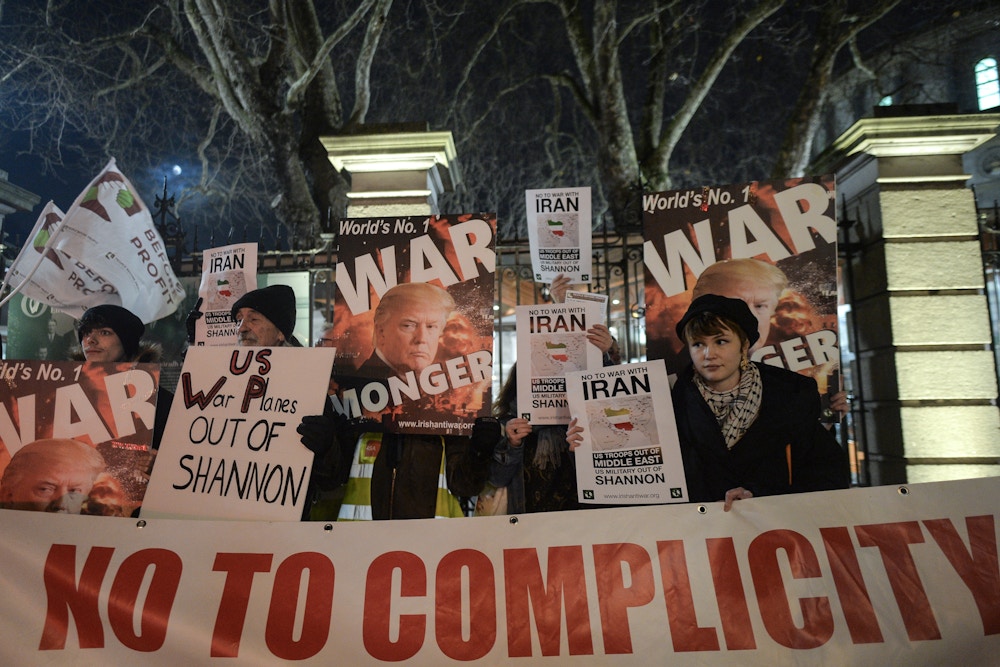 Members of the Irish Anti-War Movement organisation during a protest against Donald Trump's unlawful targeted killing of Iranian General Qasem Soleimani along with six others and the subsequent escalation of pro-war rhetoric including threatening war crimes against Iranian cultural sites.On Thursday, 9 January 2020, Leinster house, Dublin, Ireland. (Photo by Artur Widak/NurPhoto via Getty Images)