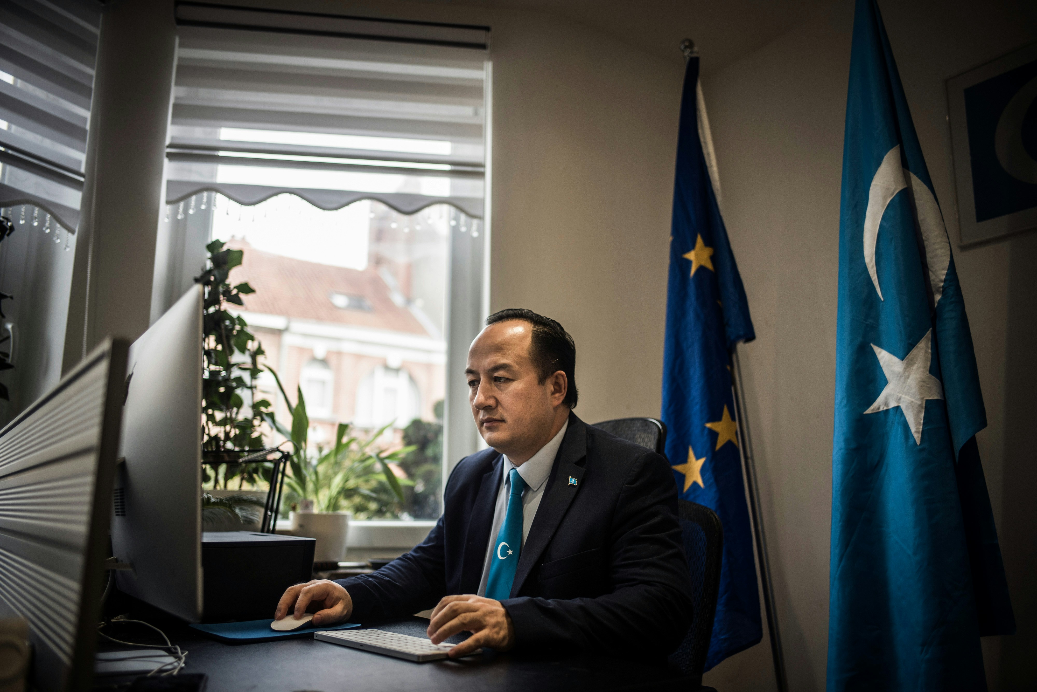 Nejmiddin Qarluq, an ethnic Uyghur, and political activist who fled china and was given asylum in Belgium is pictured at his new home in Bruxelles on Jan. 21, 2021.