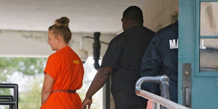 Reality Winner leaves the federal courthouse where she was sentenced in a federal court on Aug. 23, 2018 in Augusta, Ga.