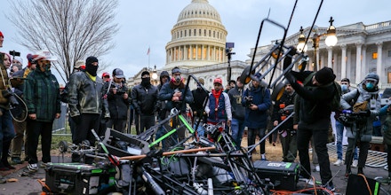 WASHINGTON D.C., USA - JANUARY 6: Equipment of media crews damaged during clashes after the US President Donald Trumps supporters breached the US Capitol security in Washington D.C., United States on January 06, 2021. Pro-Trump rioters stormed the US Capitol as lawmakers were set to sign off Wednesday on President-elect Joe Biden's electoral victory in what was supposed to be a routine process headed to Inauguration Day. (Photo by Tayfun Coskun/Anadolu Agency via Getty Images)