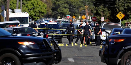 The Oakland Police Department investigates a fatal shooting in the 1900 block of 84th Ave. in Oakland, Calif., October 14, 2020.