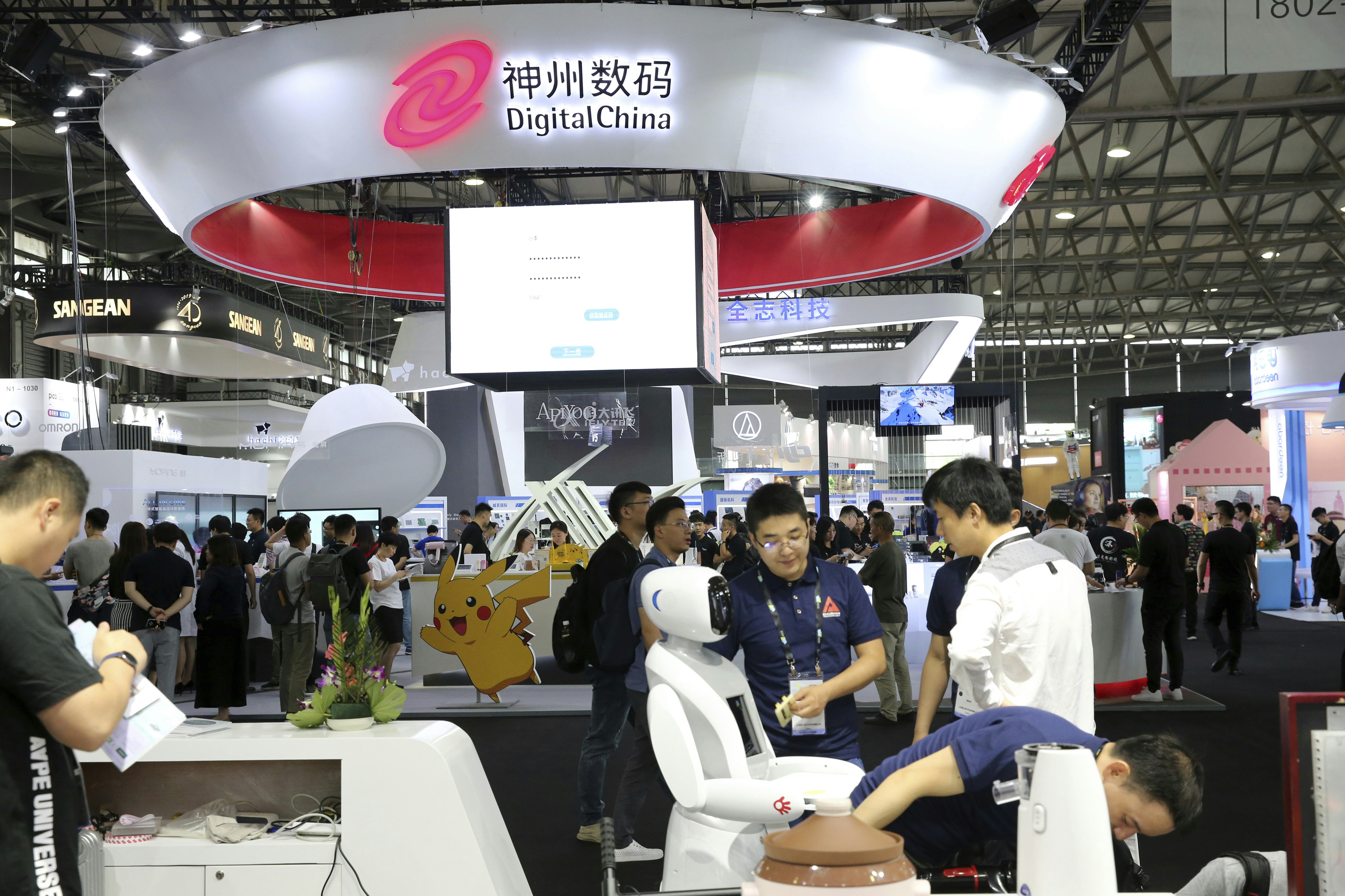 People visit the stand of Digital China during the 2019 International Consumer Electronics Show Asia in Shanghai, China, on June 11, 2019.