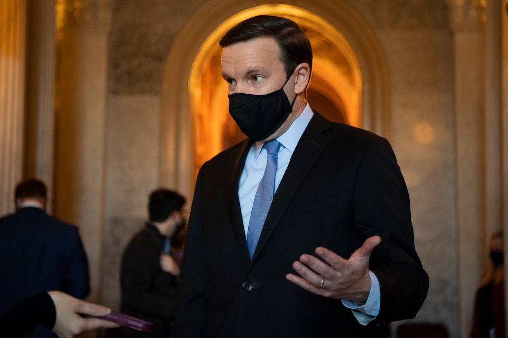 UNITED STATES - March 5: Sen. Chris Murphy, D-Conn., talks with a reporter on his way to the Senate floor in Washington on Friday, March 5, 2021. (Photo by Caroline Brehman/CQ-Roll Call, Inc via Getty Images)