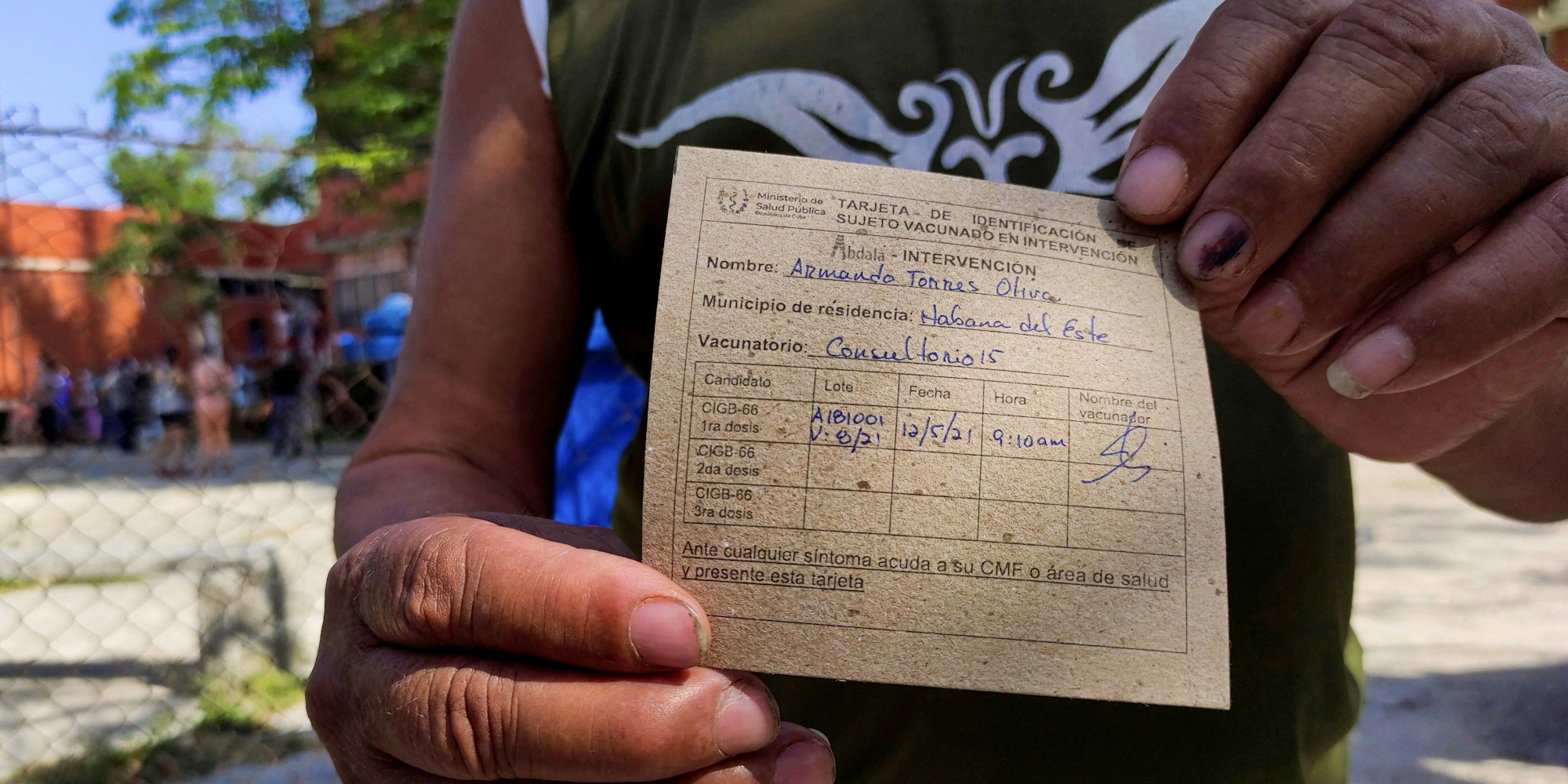 A man shows his vaccination card after receiving the first dose of Cuban vaccine candidate against covid-19 Abdala in Havana, on May 12, 2021. - Cuba began vaccinating against COVID-19 Wednesday with two of its five vaccine candidates in an intervention study mainly in Havana and the provinces of Santiago de Cuba and Matanzas. (Photo by YAMIL LAGE / AFP) (Photo by YAMIL LAGE/AFP via Getty Images)