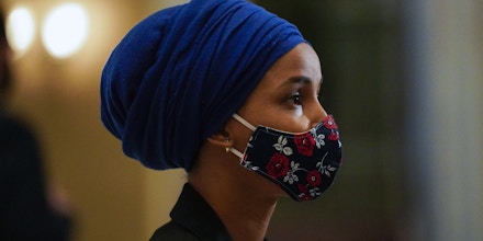 Washington, D.C. - January 12: Rep. Ilhan Omar speaks to reporters in Statuary Hall  on Capital Hill on Tuesday, Jan. 12, 2021 in Washington, D.C.. The House of Representatives convened for a session to take up articles of impeachment against President Donald Trump, nearly a week after an insurrectionist mob of pro-Trump supporters breached the security of the nation's capitol while Congress voted to certify the 2020 Election Results. (Kent Nishimura / Los Angeles Times via Getty Images)