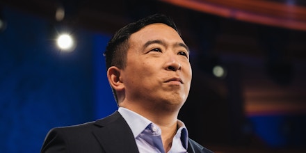 Andrew Yang, founder of Venture for America and 2020 Democratic presidential candidate, stands on stage during the Democratic presidential candidate debate in Miami, Florida, U.S., on Thursday, June 27, 2019. Former U.S. Vice President Joe Biden opened the second night of the Democratic presidential debates with a direct attack on President Donald Trump's handling of the economy, setting the tone for a night in which he and nine other hopefuls sought to demonstrate for voters the stark choice they will have in the 2020 election. Photographer: Jayme Gershen/Bloomberg via Getty Images
