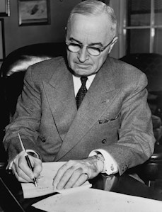 Truman Signs Proclamation