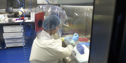 A researcher works in a lab of Wuhan Institute of Virology (WIV) in Wuhan in central China's Hubei province Thursday, Feb. 23, 2017.  (FeatureChina via AP Images)