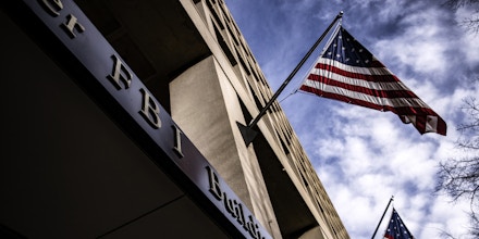 American flags fly outside FBI headquarters in Washington, D.C., on  Jan. 2, 2021.