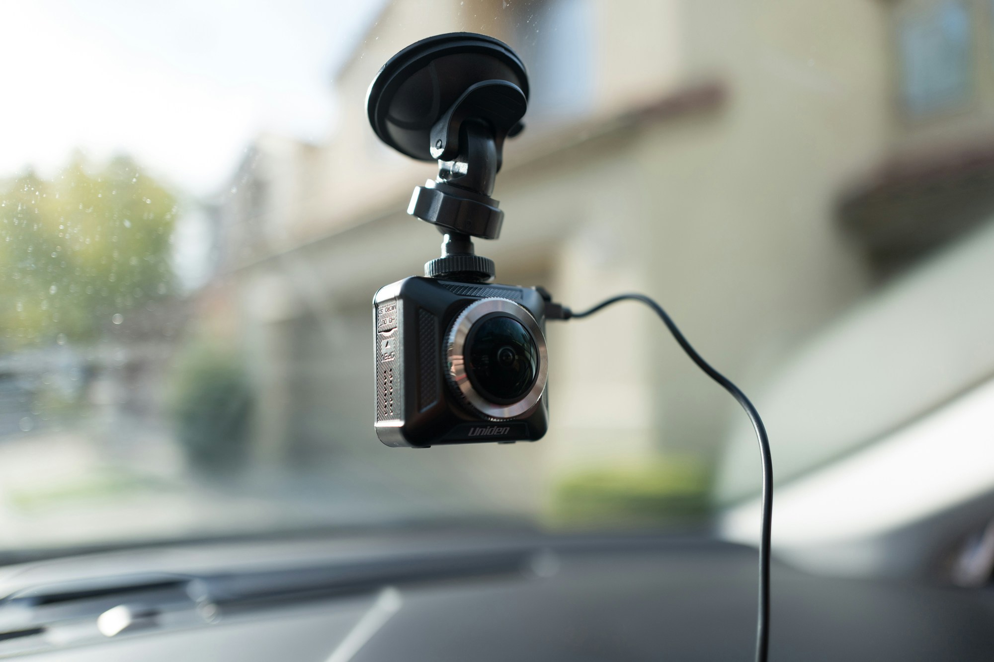 Close-up of Uniden dashboard camera (dashcam) installed on the interior window of an Uber vehicle in San Ramon, California; dashcams are often used by crowdsourced taxi drivers to increase driver and passenger safety, September 27, 2018. (Photo by Smith Collection/Gado/Getty Images)
